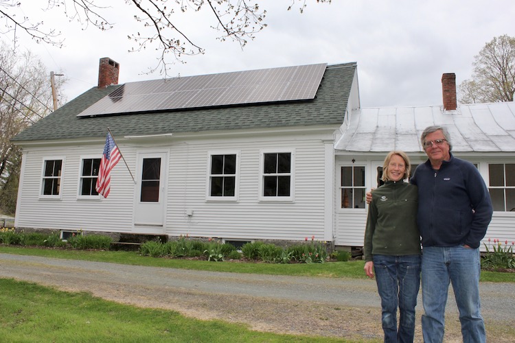 Solar homeowners in front of their house in Danville